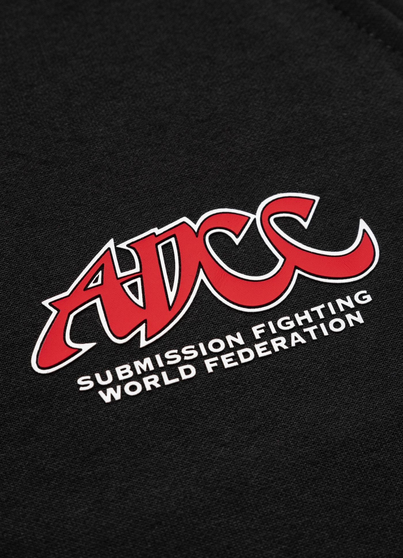 ADCC red logo and submission fighting world federation white text on black 